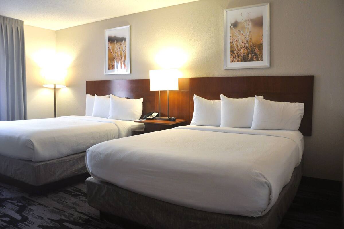 desk, laptop workspace, blackout curtains, iron/ironing board