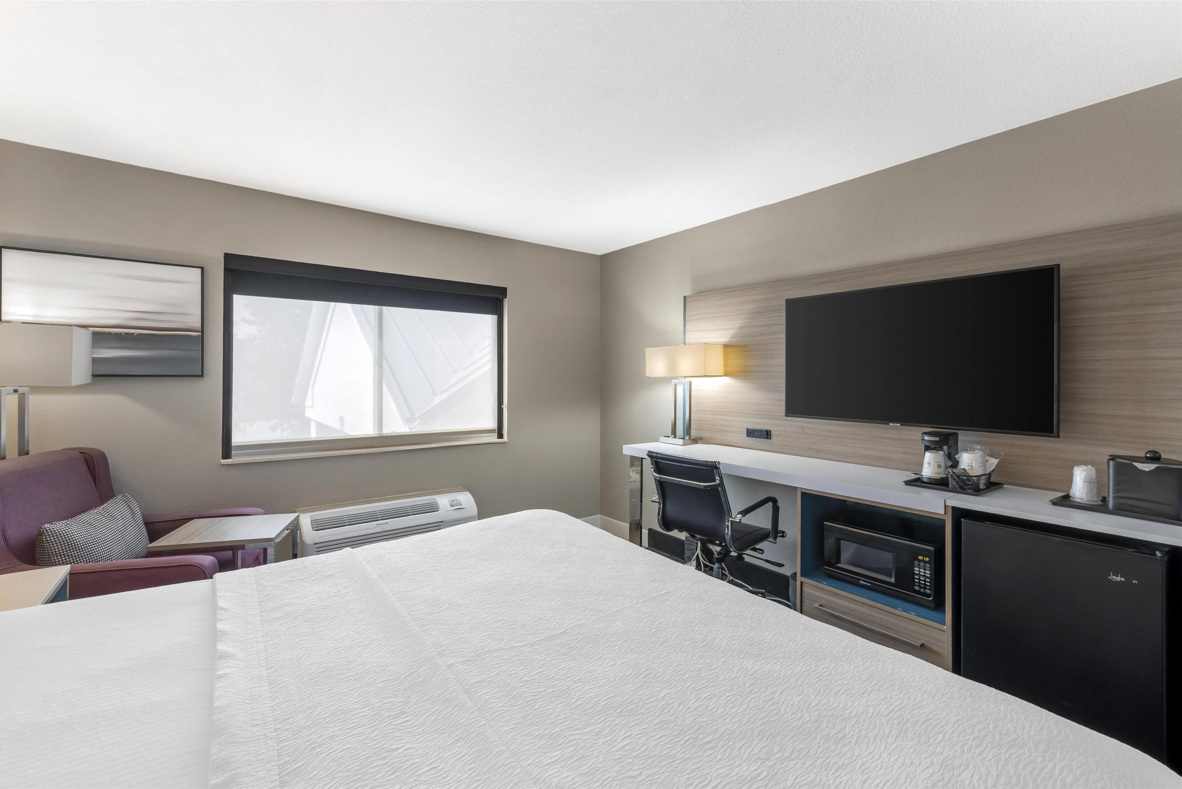 desk, blackout curtains, iron/ironing board, free cots/infant beds