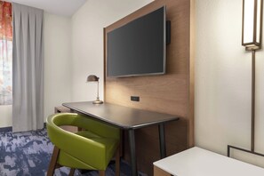 Premium bedding, desk, laptop workspace, iron/ironing board