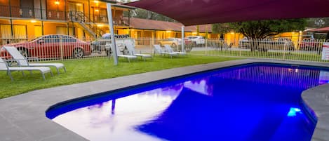 Outdoor pool, open 8:00 AM to 9:00 PM, pool loungers