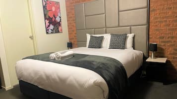 Executive King Room | Desk, blackout curtains, iron/ironing board, free WiFi