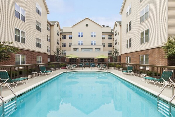 Seasonal outdoor pool, pool loungers