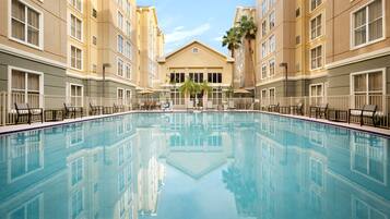 Outdoor pool, open 9:00 AM to 10:00 PM, sun loungers