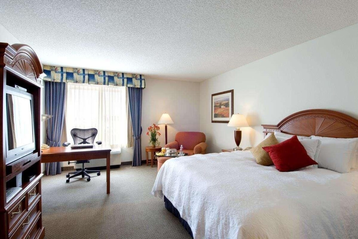 Desk, iron/ironing board, cribs (free), WiFi (free)