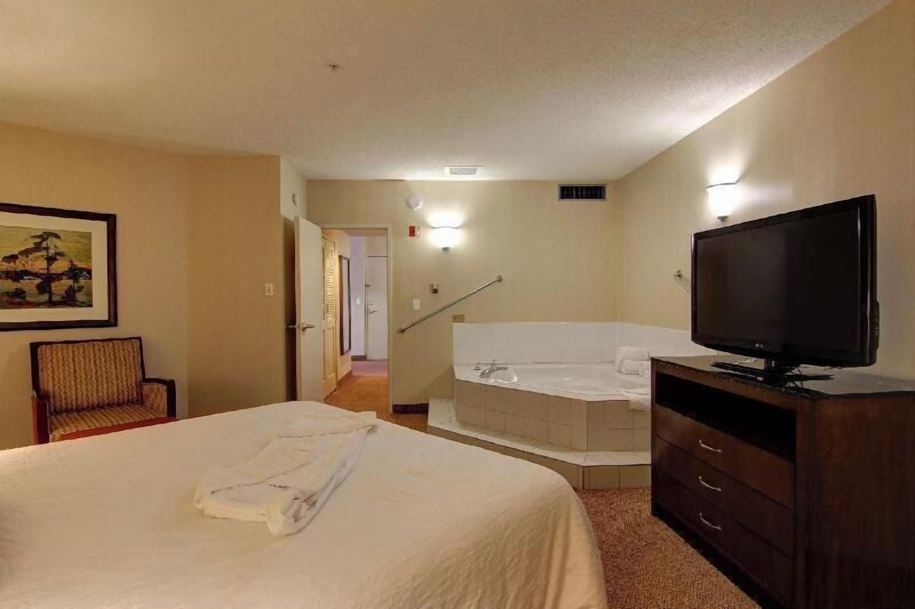 Premium bedding, down comforters, desk, blackout drapes