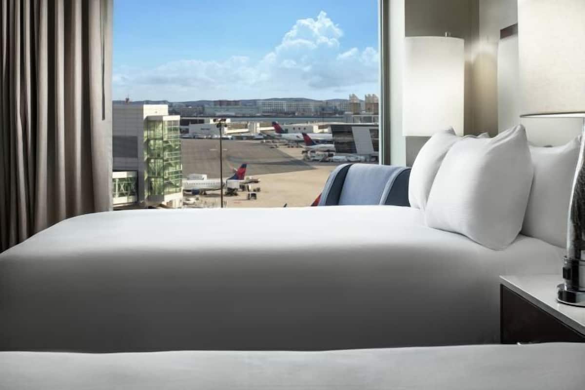 Hypo-allergenic bedding, in-room safe, desk, laptop workspace