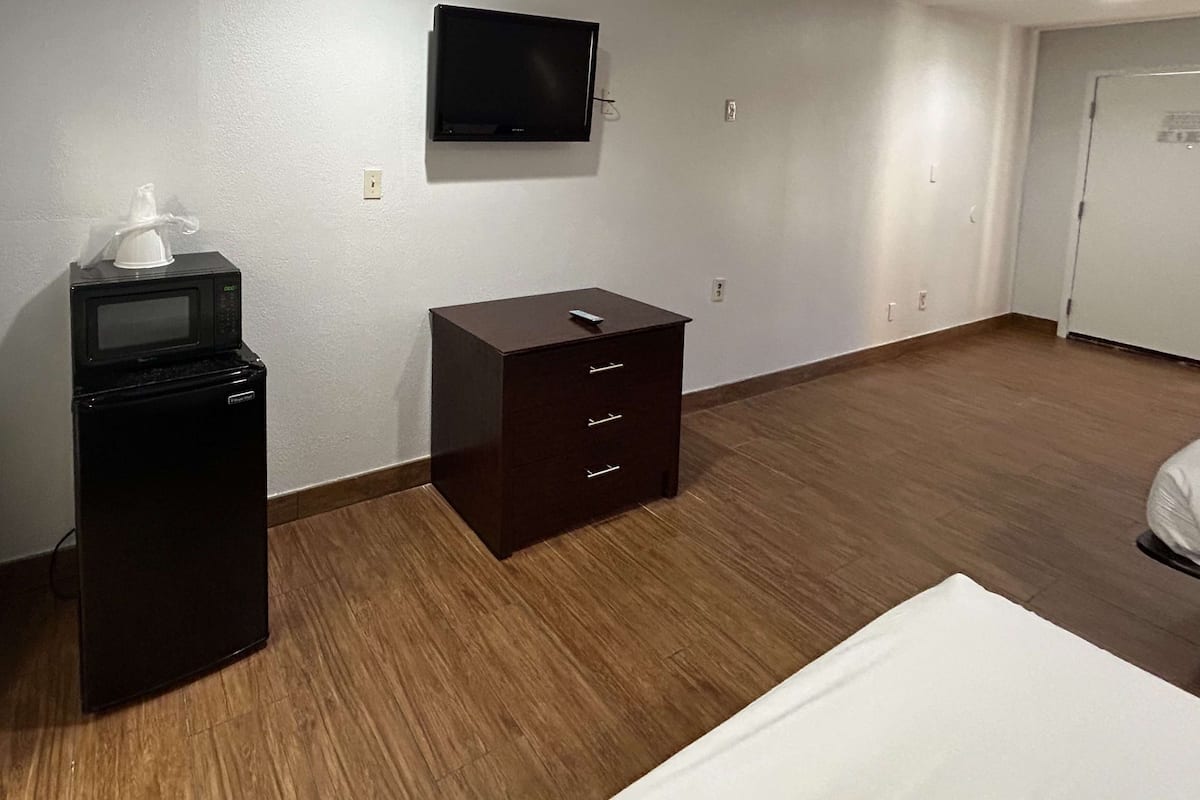 Desk, laptop workspace, blackout drapes, free WiFi