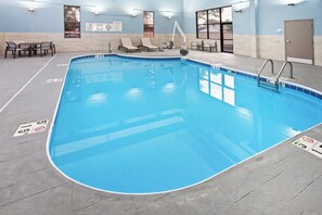 Indoor pool, open 7:00 AM to 11:00 PM, pool loungers