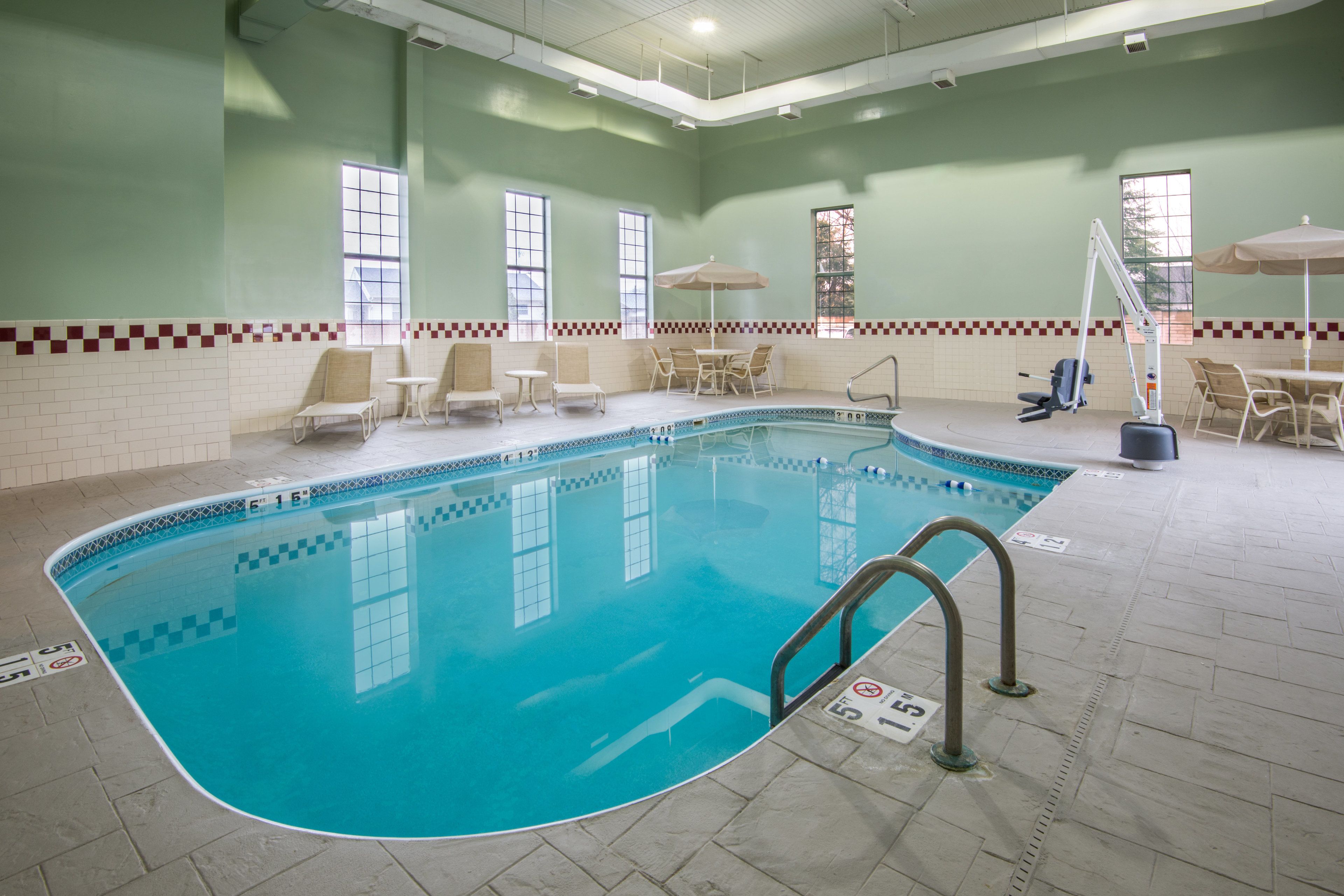 indoor pool, open 7:00 am to 11:00 pm, pool loungers