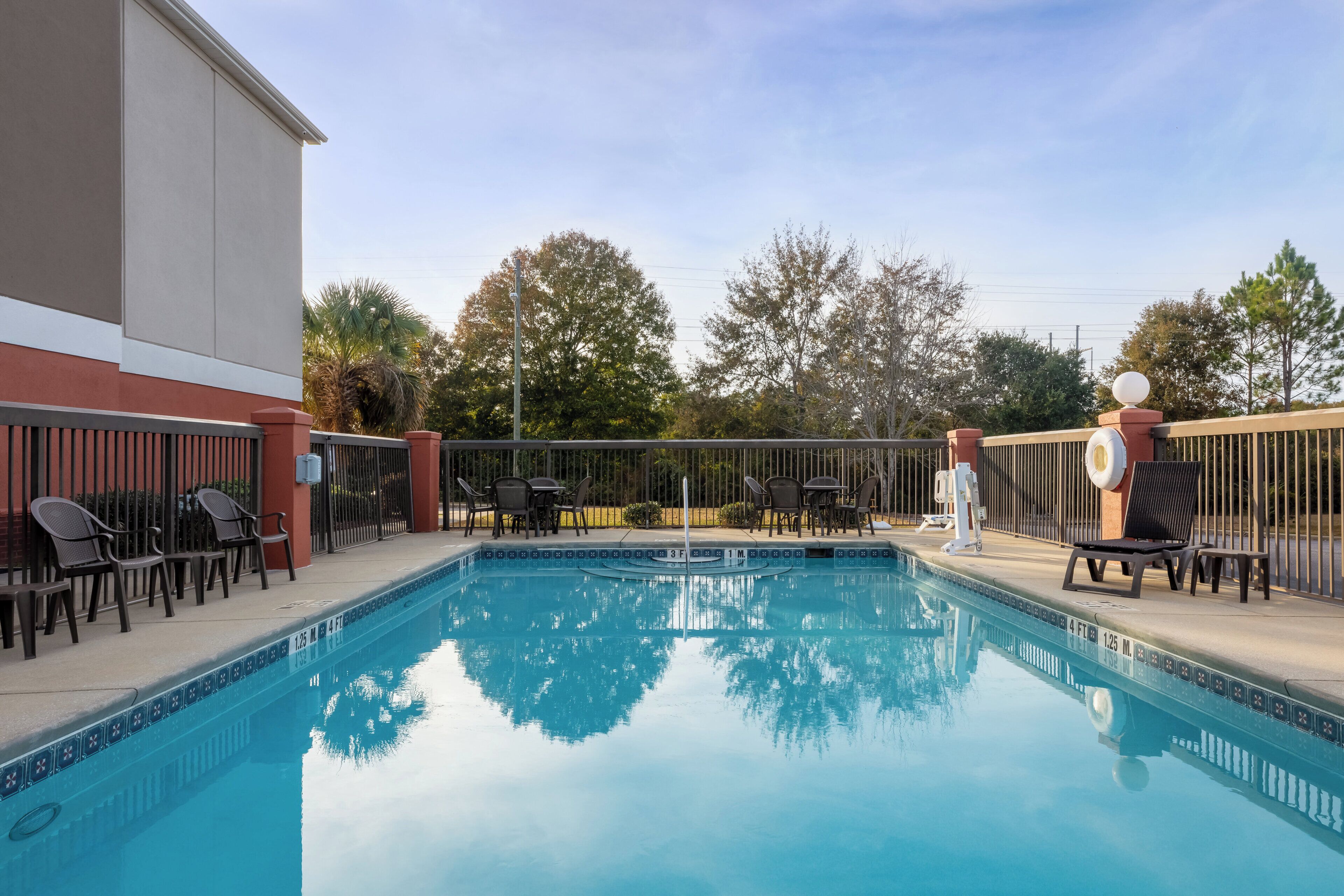 Seasonal outdoor pool, open 7 AM to 10 PM, sun loungers