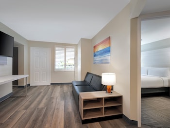 1 bedroom, in-room safe, desk, blackout drapes at Holiday Inn Resort Orlando Suites - Waterpark by IHG