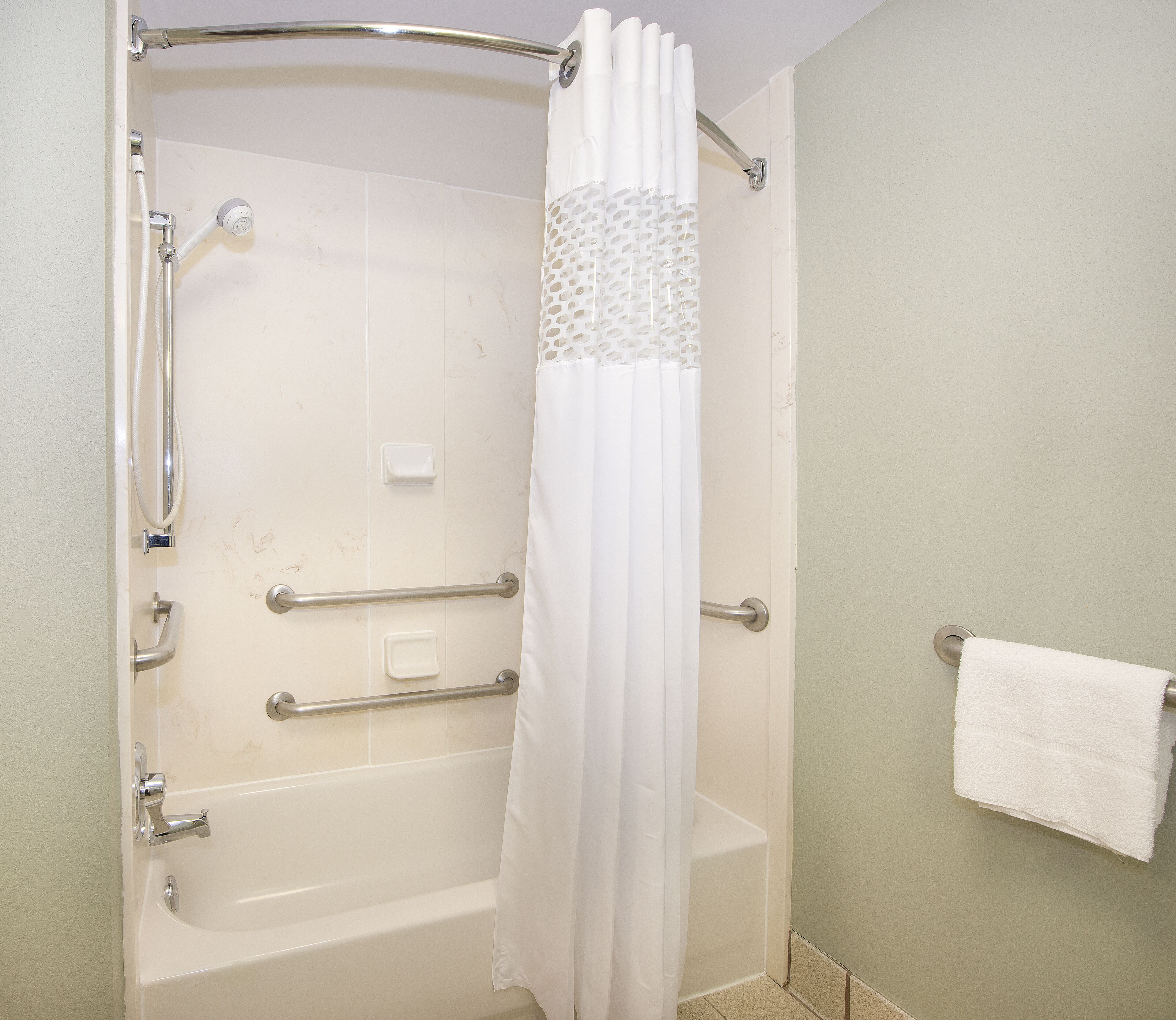combined shower/bathtub, free toiletries, hair dryer, towels