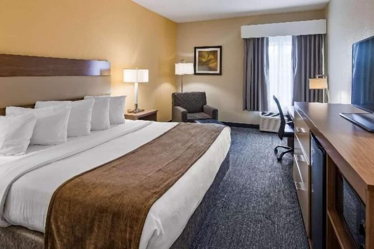 Premium bedding, desk, blackout curtains, iron/ironing board