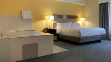 Suite, 1 King Bed, Non Smoking, Jetted Tub | Premium bedding, desk, blackout drapes, iron/ironing board
