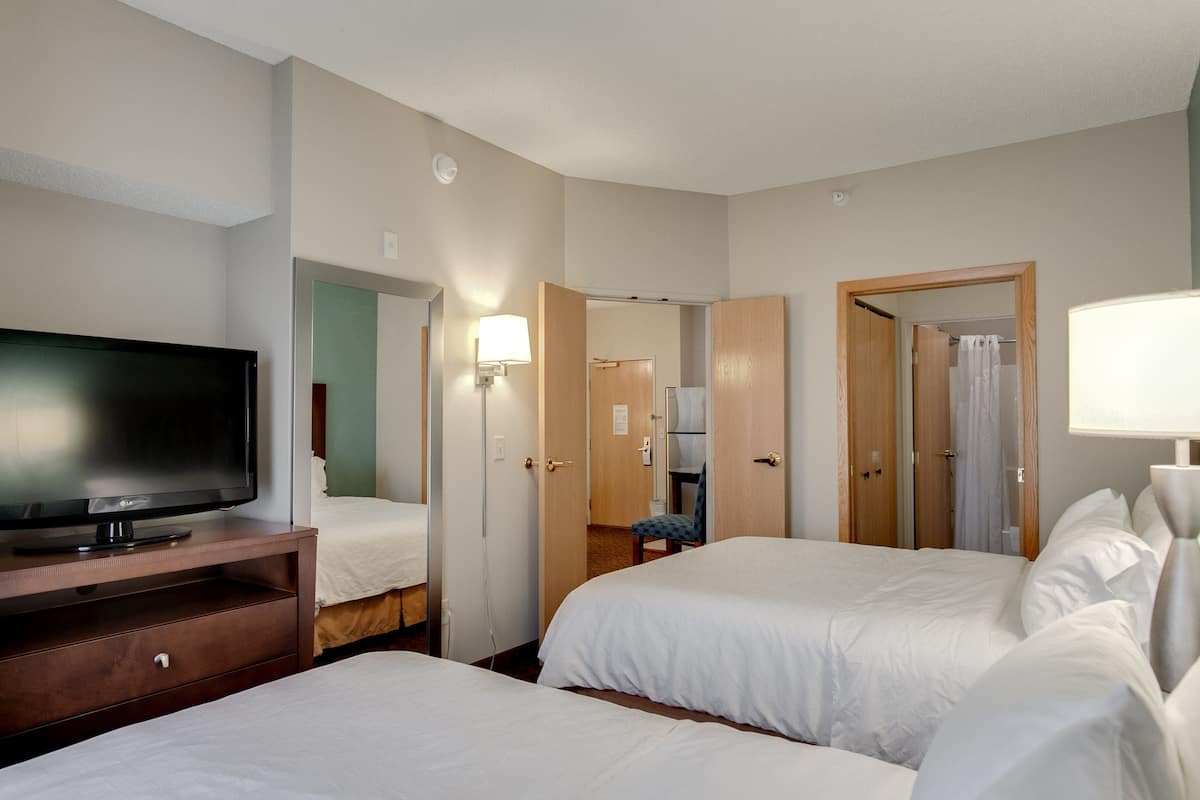 suite, 1 bedroom (extended stay) | 1 bedroom, desk, iron/ironing board, free cots/infant beds