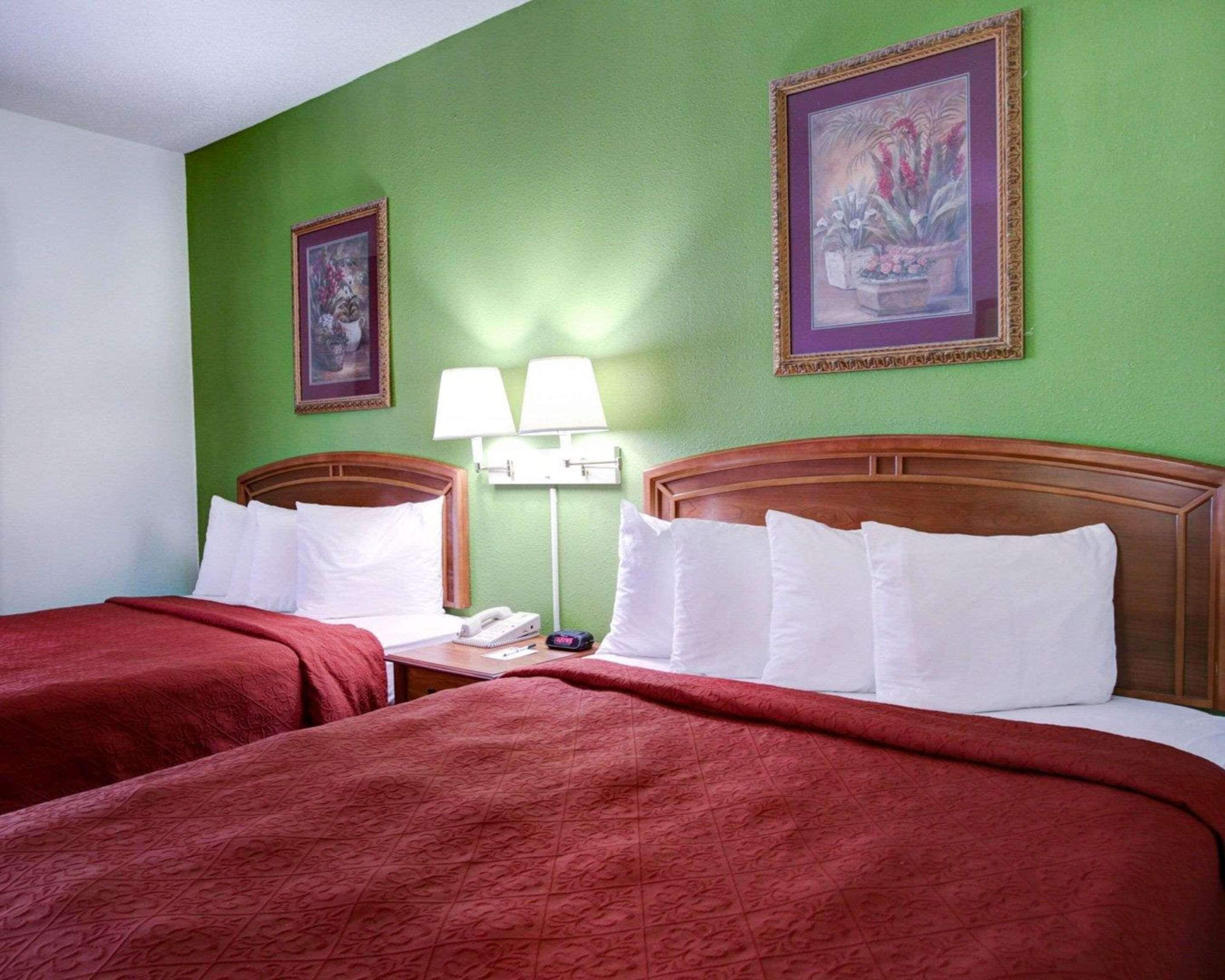 suite, 2 queen beds, non smoking | desk, blackout curtains, iron/ironing board, cots/infant beds