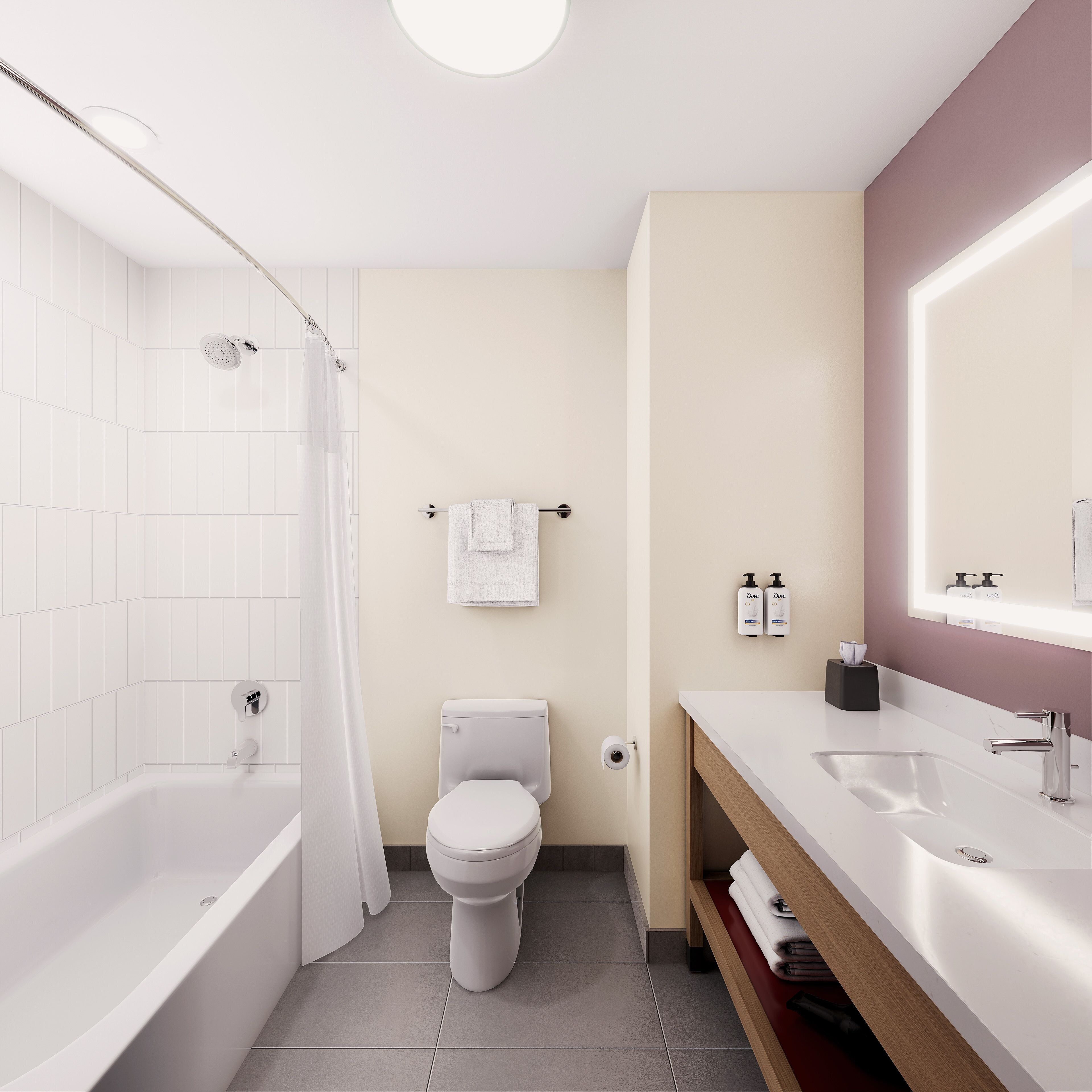 Combined shower/tub, designer toiletries, hair dryer, towels