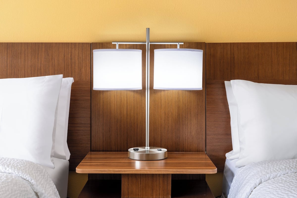 Desk, blackout drapes, iron/ironing board, cribs (surcharge)