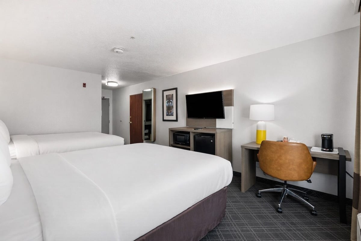 Premium bedding, pillowtop beds, desk, laptop workspace