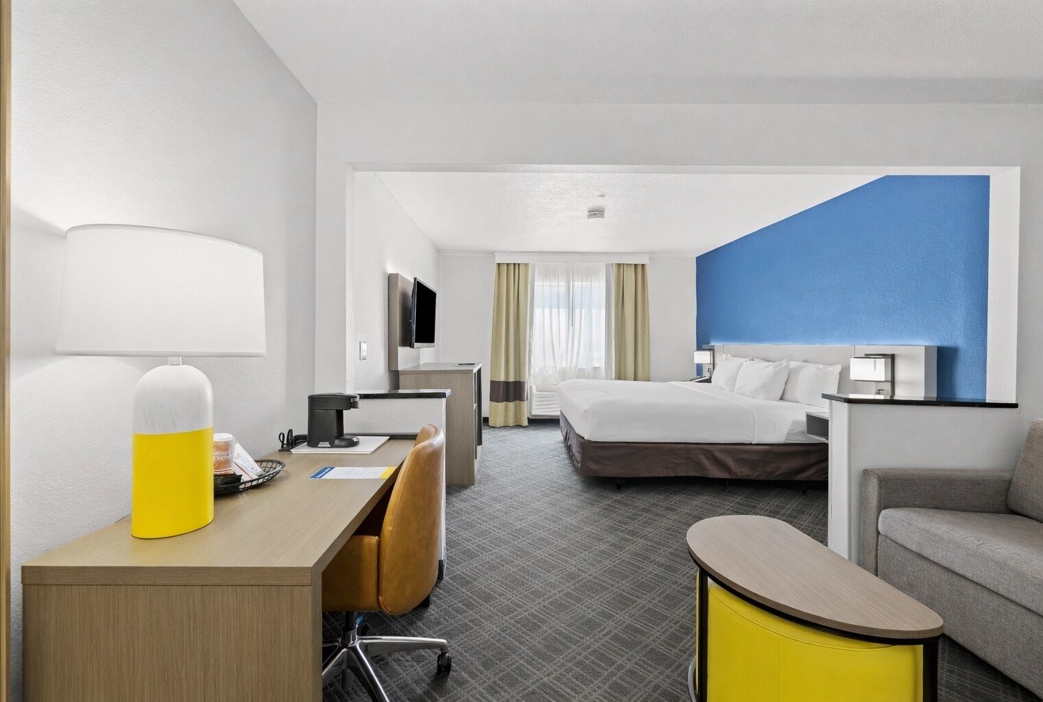 Premium bedding, pillowtop beds, desk, laptop workspace