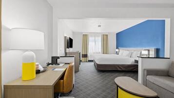 Premium bedding, pillowtop beds, desk, laptop workspace