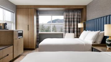 Room, 2 Queen Beds, Corner | Hypo-allergenic bedding, down comforters, in-room safe, desk