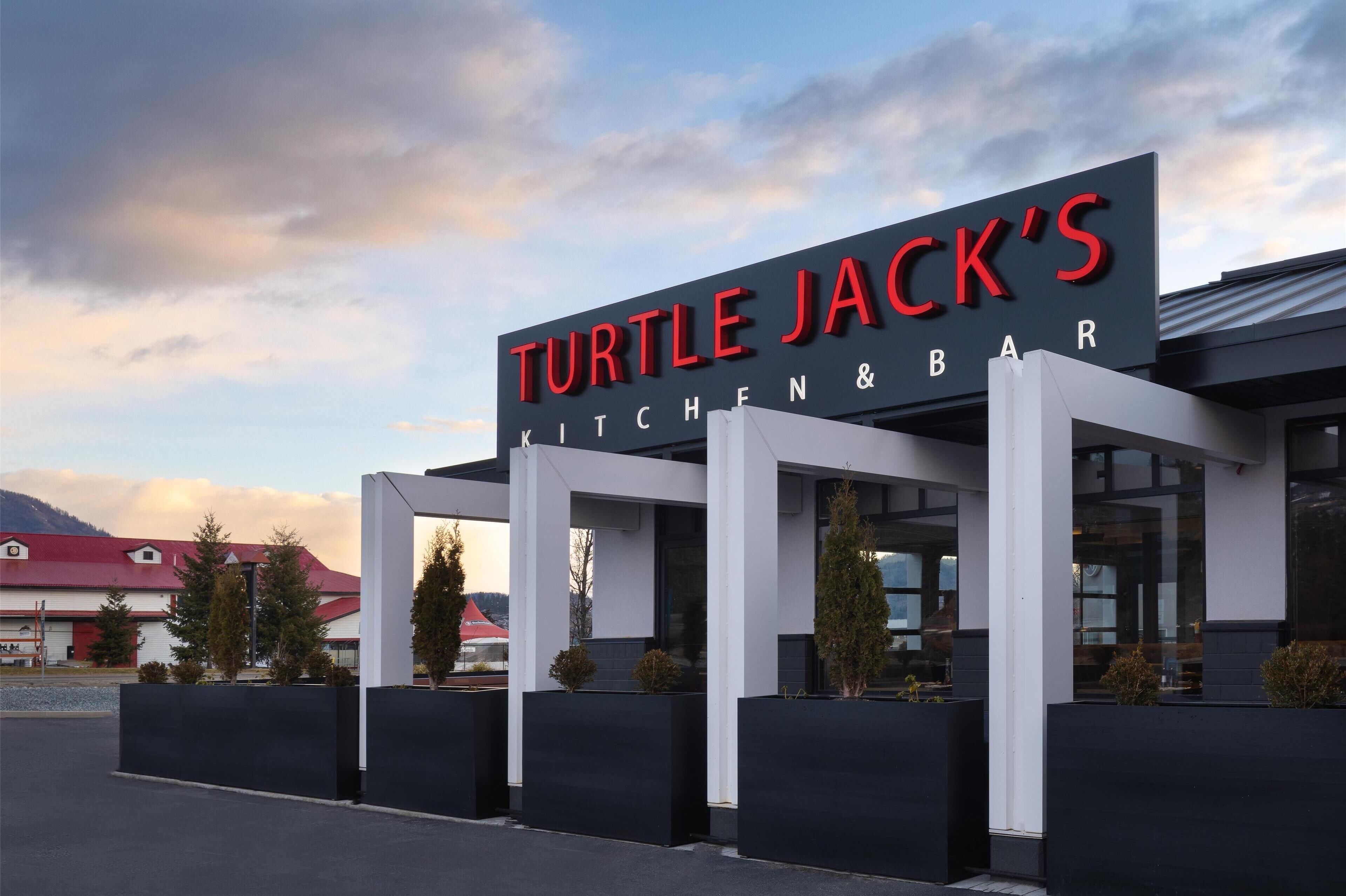 A modern building with a sign that reads "Turtle Jack's Kitchen & Bar".