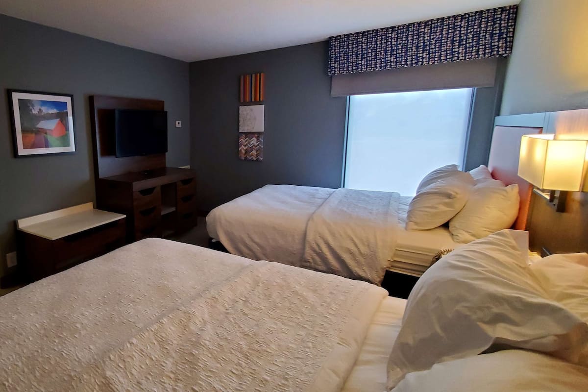 Suite, 2 Queen Beds, Non Smoking | 1 bedroom, hypo-allergenic bedding, in-room safe, individually decorated