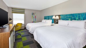 A hotel room with two beds, a desk, a chair, and a large window. - Hampton Inn Marysville (Marysville)