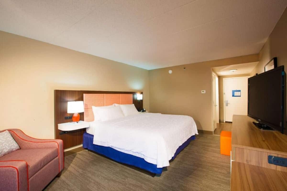 Premium bedding, pillow-top beds, blackout curtains, iron/ironing board
