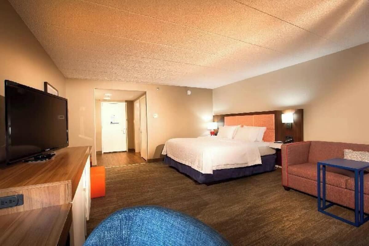 Premium bedding, pillow-top beds, blackout curtains, iron/ironing board