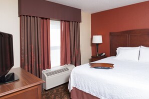 Desk, blackout drapes, iron/ironing board, bed sheets