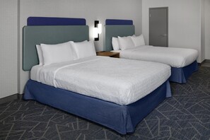 Desk, blackout curtains, iron/ironing board, bed sheets