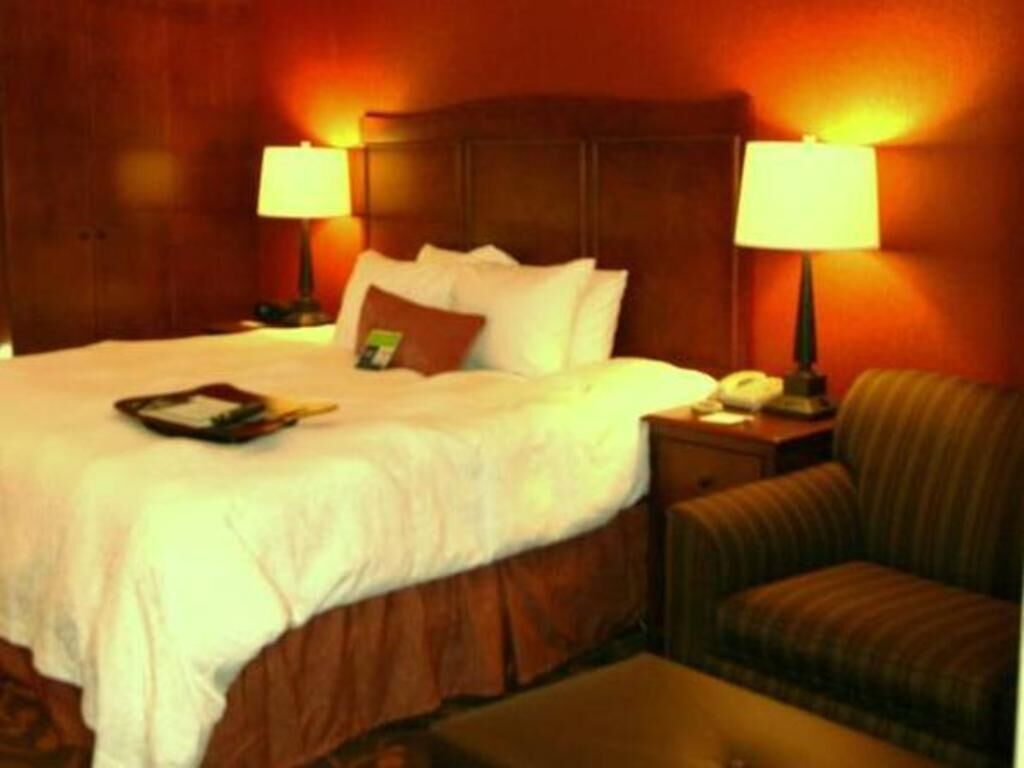 Desk, blackout drapes, iron/ironing board, bed sheets