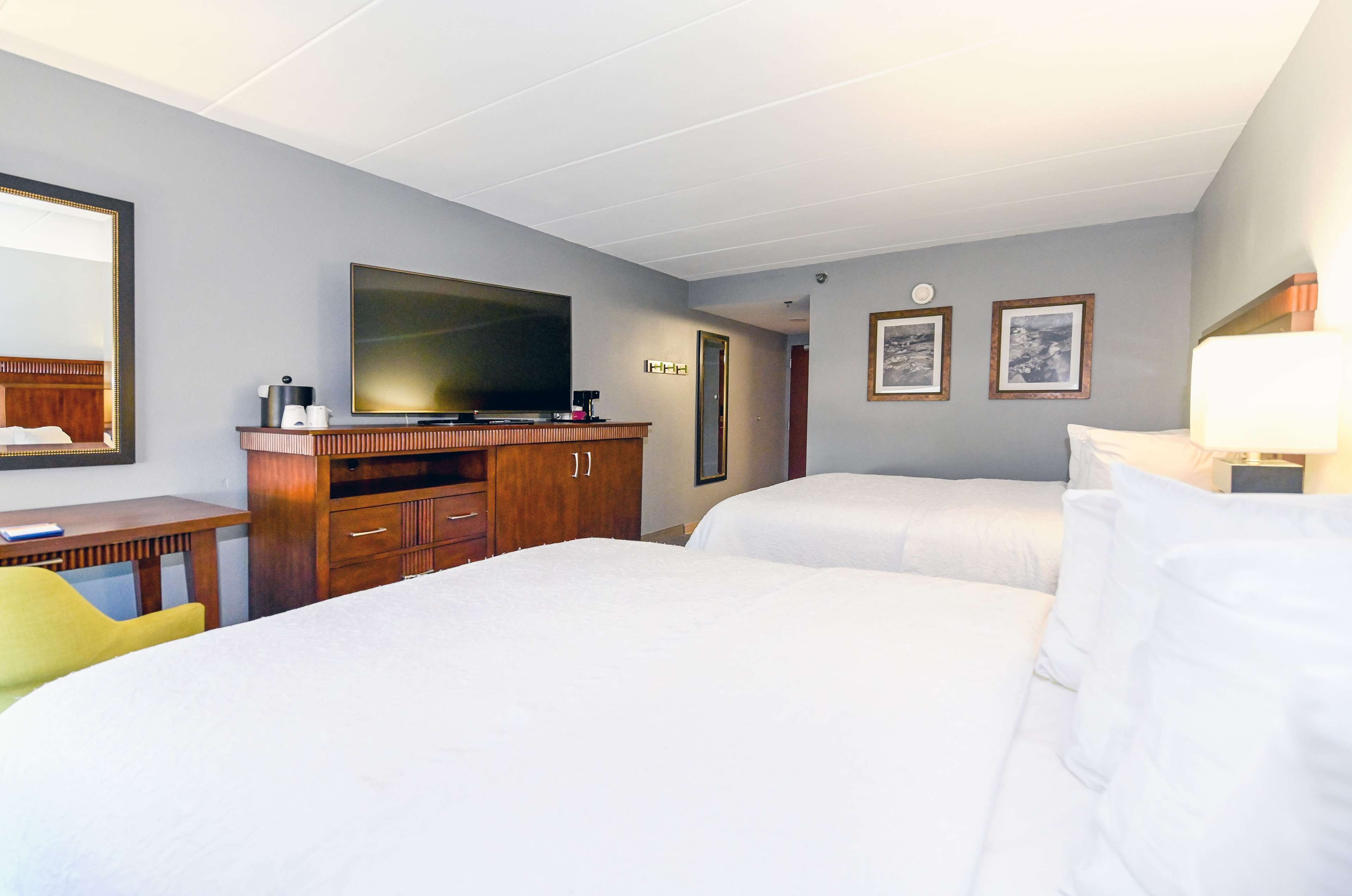 room, 2 queen beds | in-room safe, iron/ironing board, free cots/infant beds, free wifi