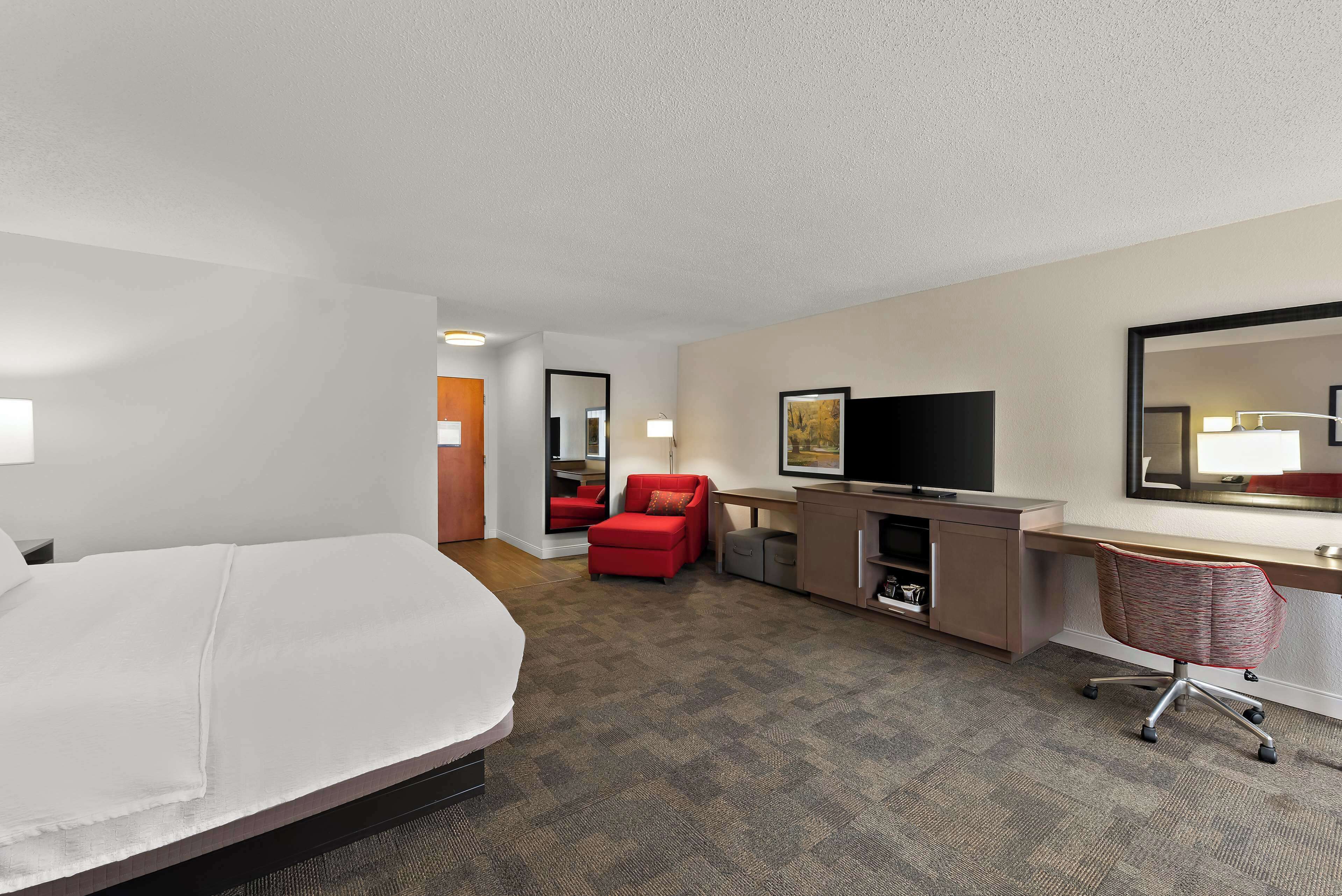 suite, 1 king bed, non smoking | in-room safe, iron/ironing board, free cots/infant beds, wifi