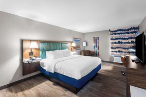 Desk, laptop workspace, iron/ironing board, cribs/infant beds