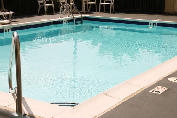 Outdoor pool, open 10 AM to 10 PM, sun loungers