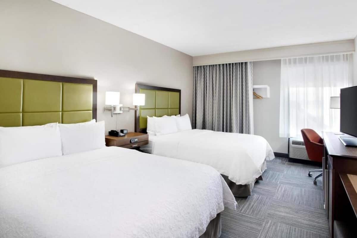 Premium bedding, pillowtop beds, desk, laptop workspace