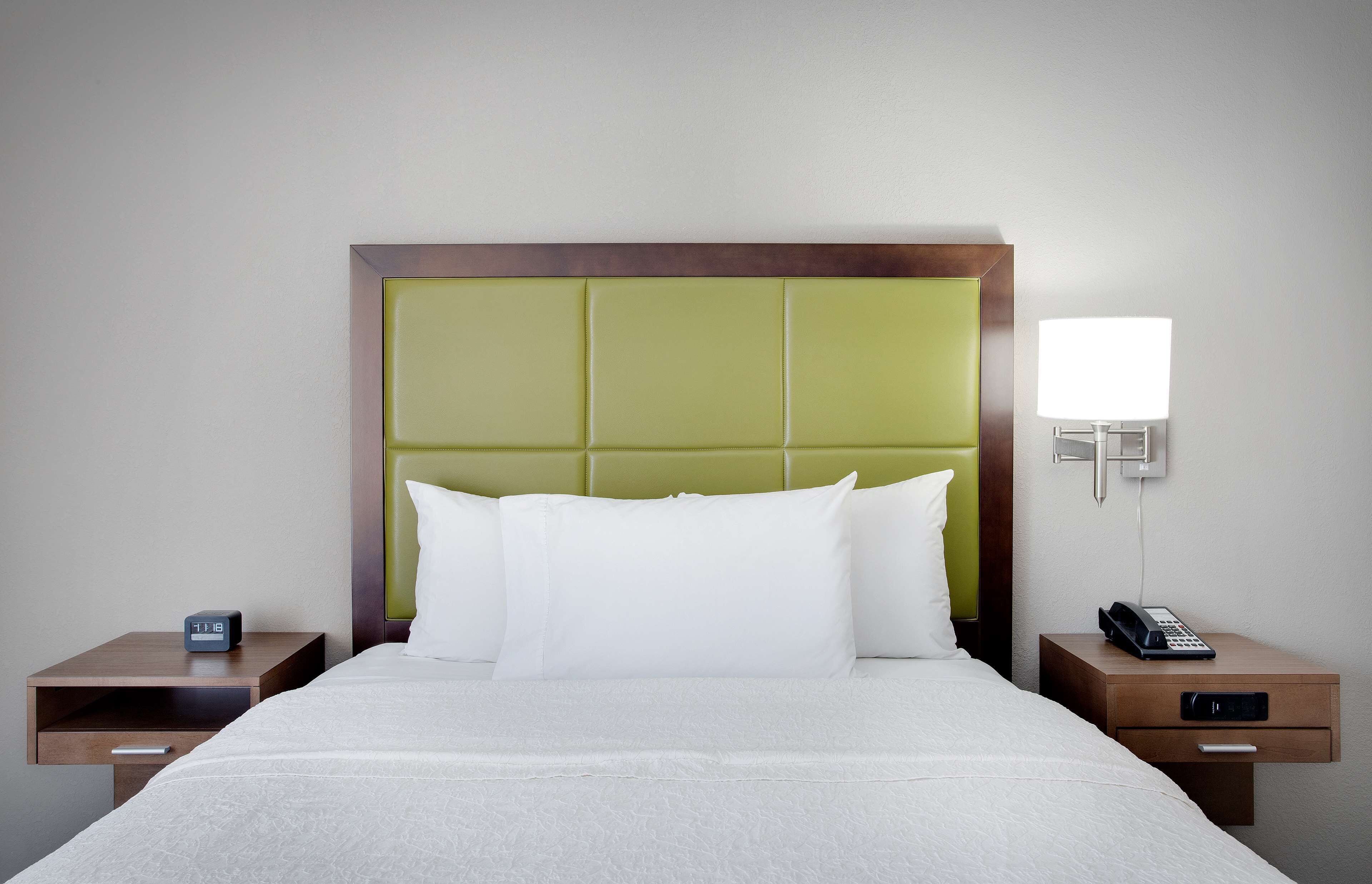 premium bedding, pillow-top beds, desk, laptop workspace