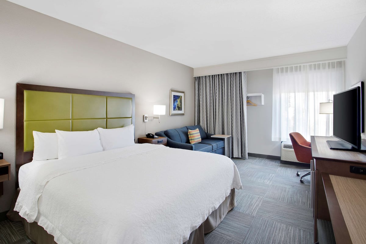 Premium bedding, pillow-top beds, desk, laptop workspace