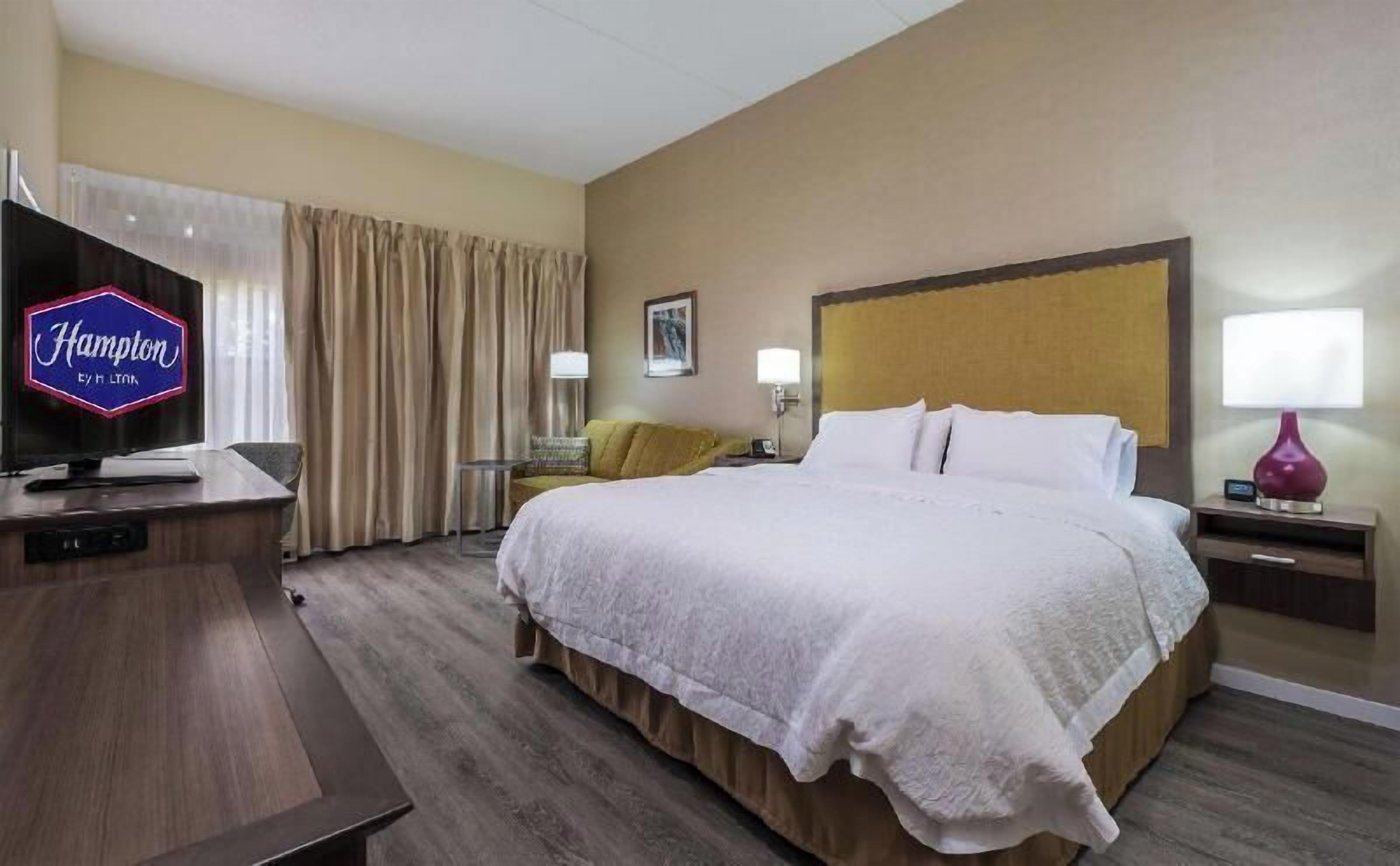 Premium bedding, desk, blackout drapes, iron/ironing board
