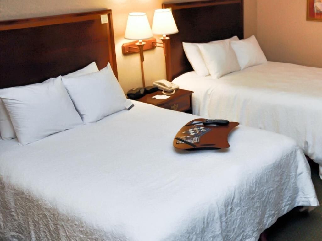 Premium bedding, desk, blackout drapes, iron/ironing board