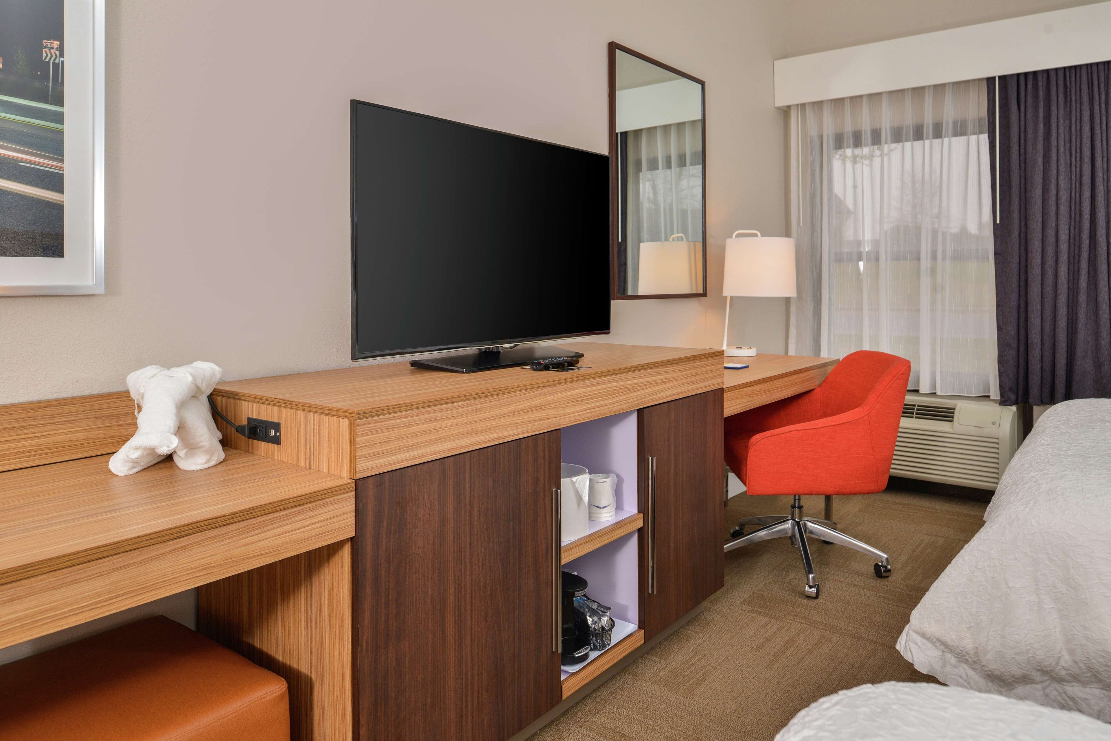 premium bedding, desk, blackout curtains, iron/ironing board