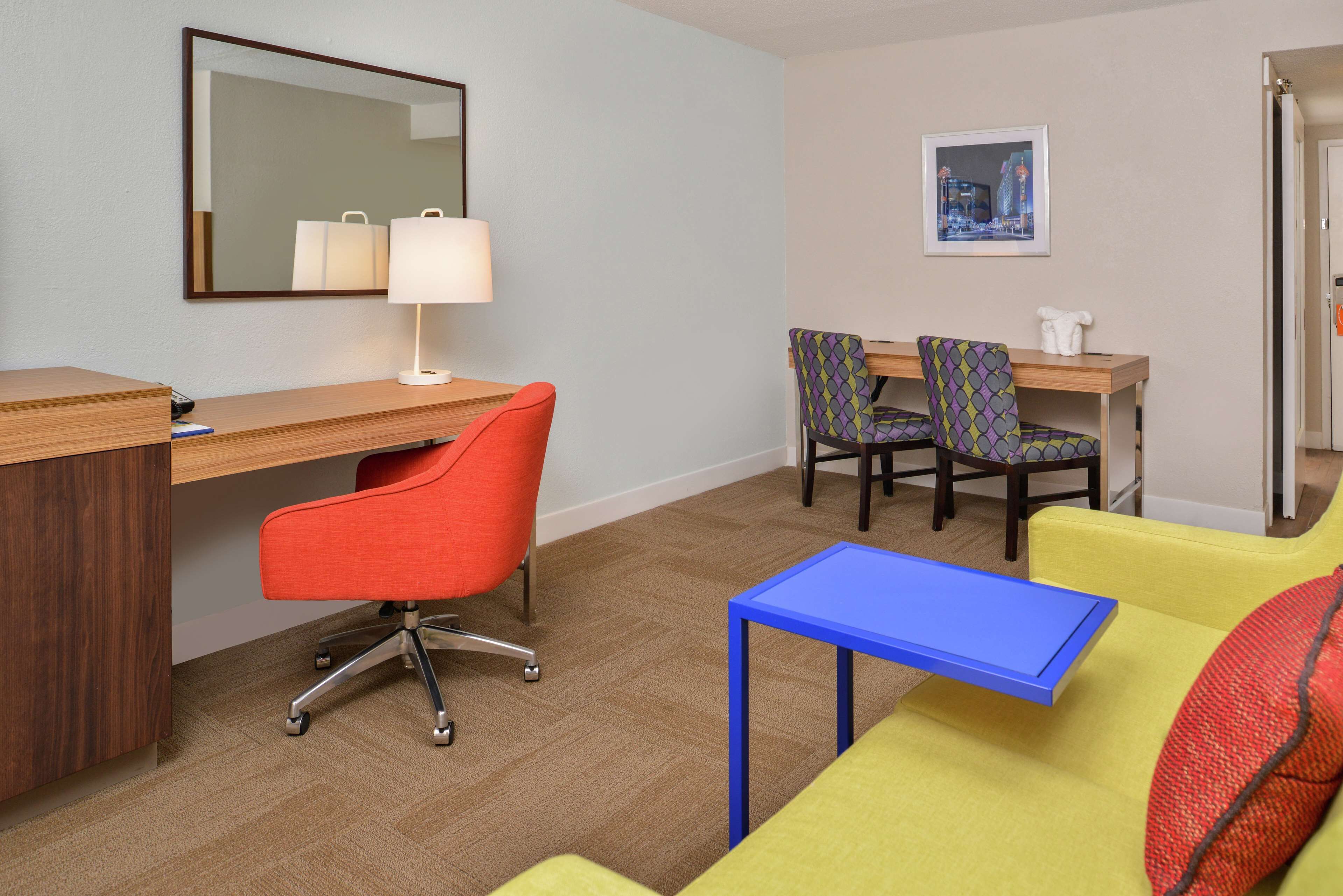 suite, 1 king bed, non smoking | premium bedding, desk, blackout curtains, iron/ironing board