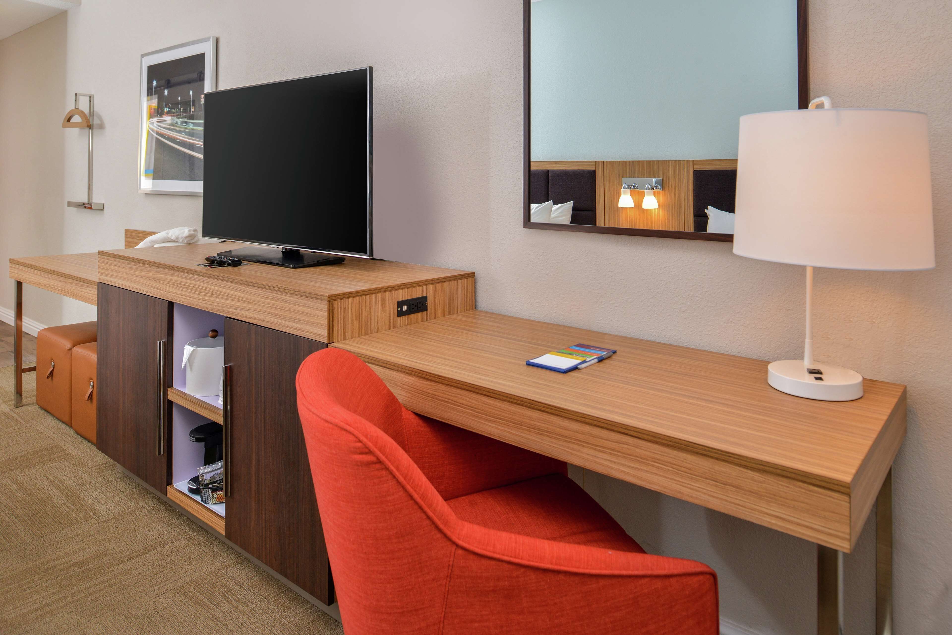 premium bedding, desk, blackout curtains, iron/ironing board