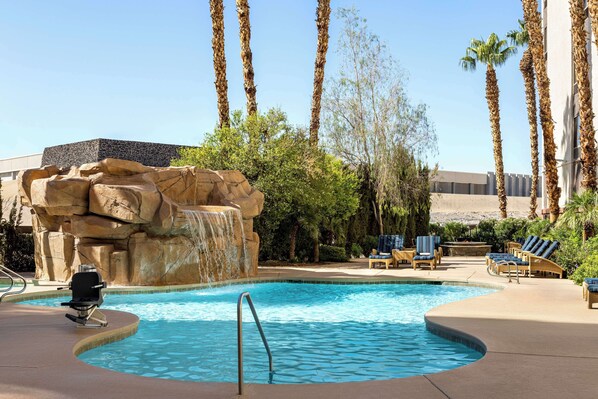 Outdoor pool, open 8:00 AM to 10:00 PM, sun loungers