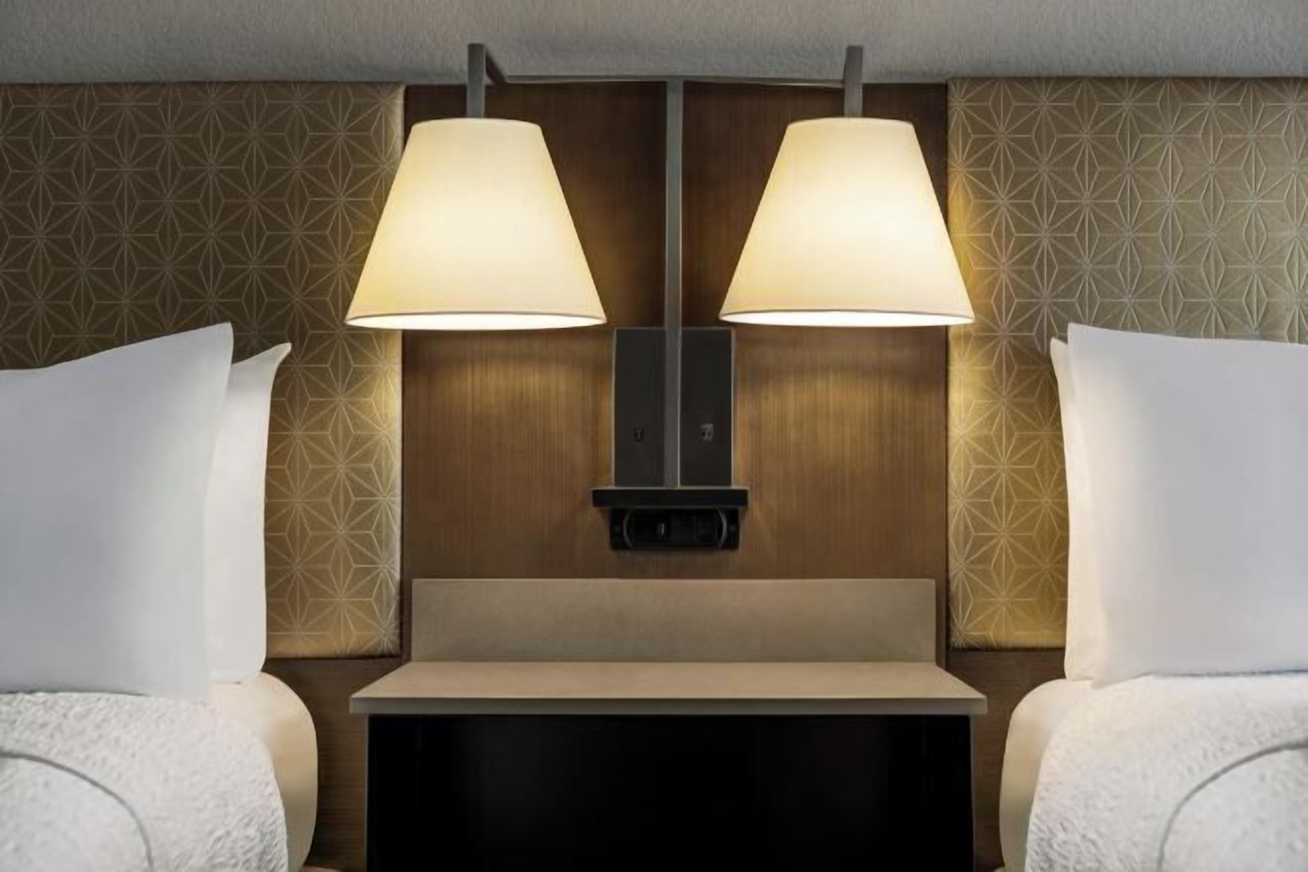 Hypo-allergenic bedding, in-room safe, desk, laptop workspace