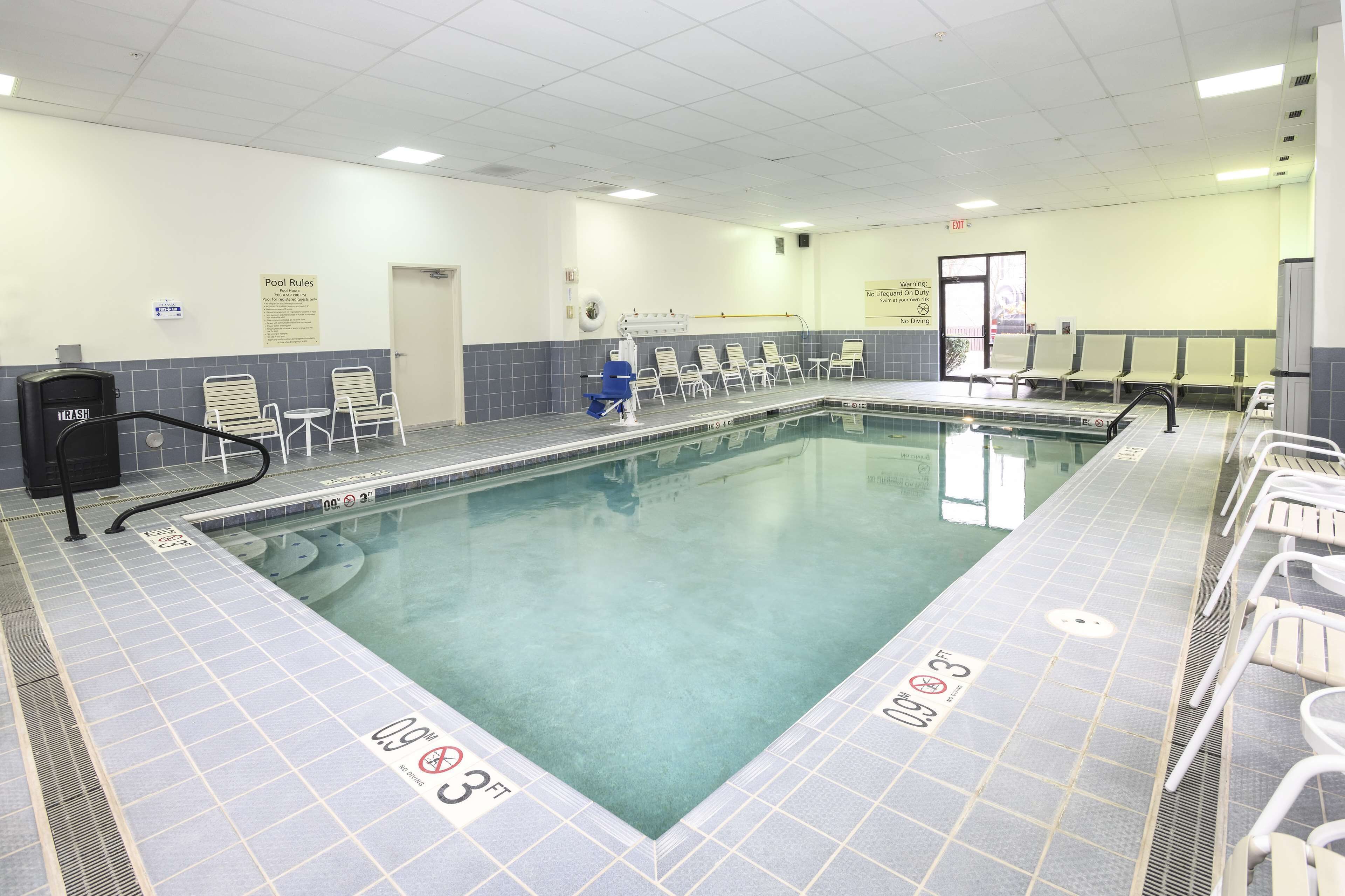 indoor pool, outdoor pool, open 7 am to 11 pm, pool loungers