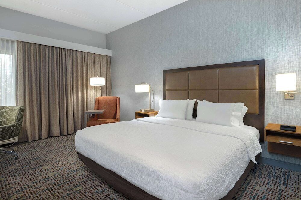 Premium bedding, blackout curtains, iron/ironing board